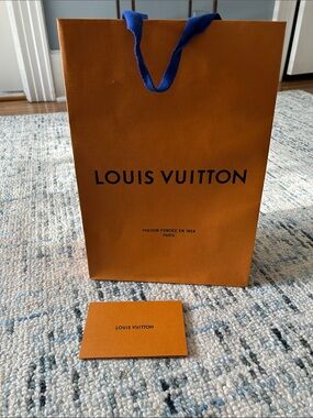 Authentic Louis Vuitton shopping bag and receipt card
